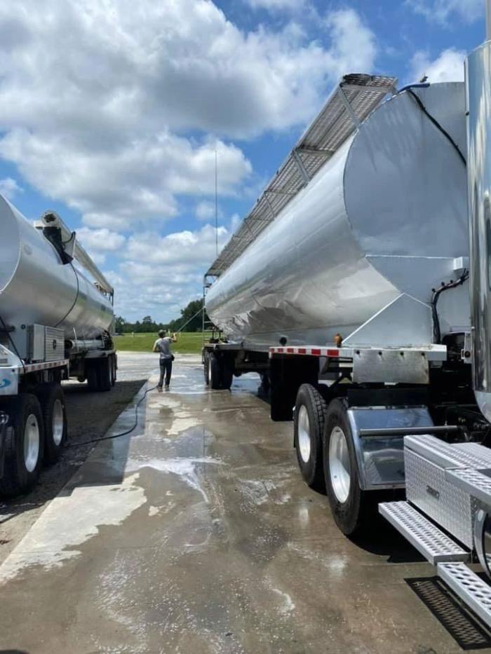 Tanker trailers being washed on site at a customer yard